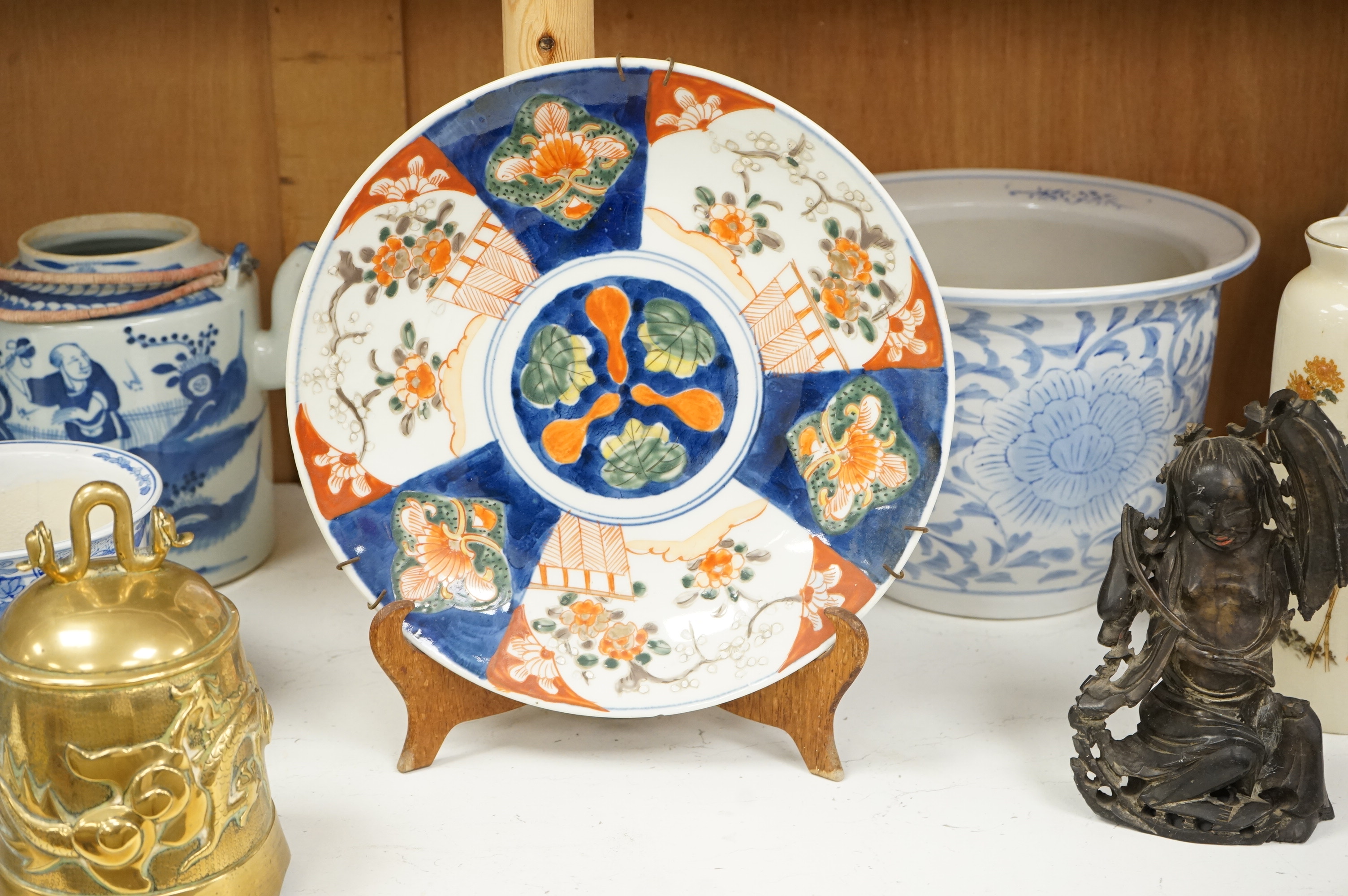 A large collection of various Chinese and Japanese ceramics and collectables to include a 19th century white glazed porcelain figure of Guanyin, largest 30.5cm